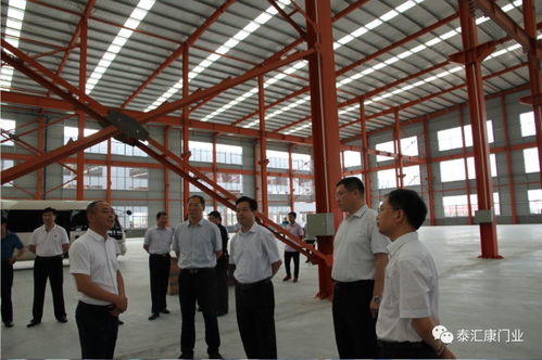 市人大常委會(huì)副主任顧建華到泰匯康門業(yè)新廠調(diào)研